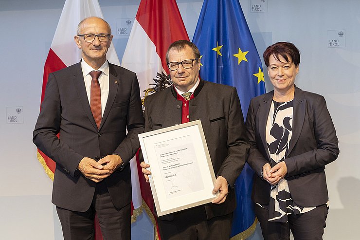 © Land Tirol/Die Fotografen Drei Menschen auf einem Foto.