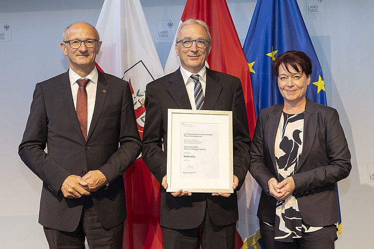 © Land Tirol/Die Fotografen Drei Menschen auf einem Foto.