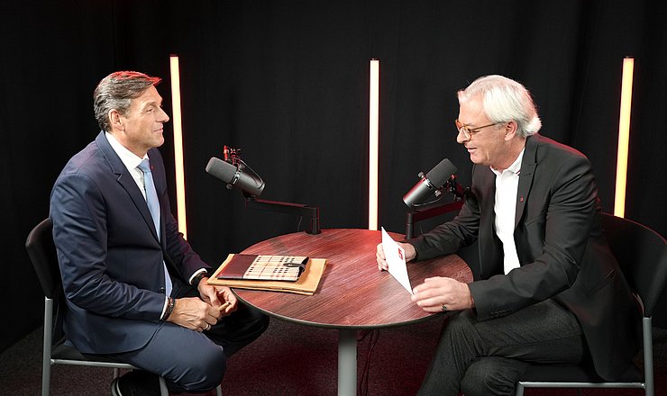 Zwei Herren im Gespräch