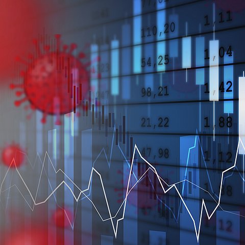 Symbolische Darstellung von Corona-Viren vor Tabellen mit Zahlen.
