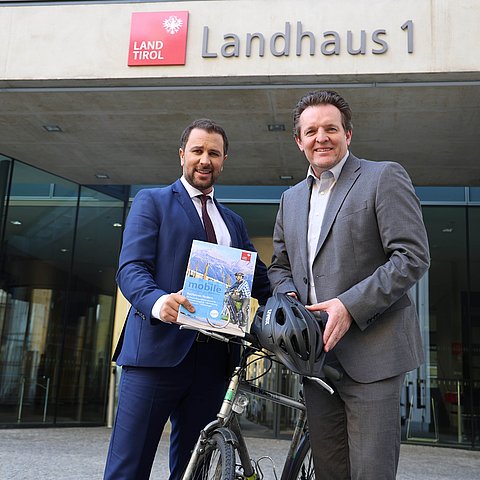 Dornauer und Zumtobel mit Fahrrad