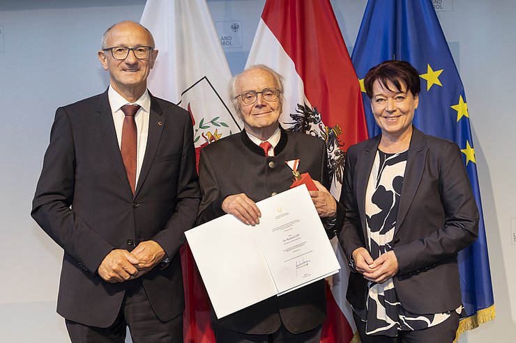 © Land Tirol/Die Fotografen Drei Menschen auf einem Foto.