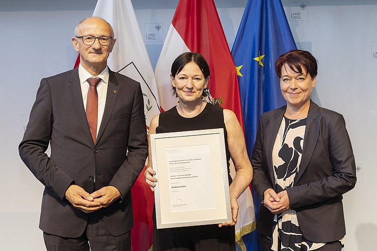 © Land Tirol/Die Fotografen Drei Menschen auf einem Foto.