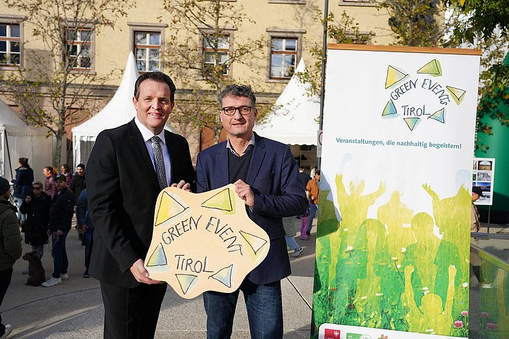 Zumtobel und Stigger mit Green Events Schild