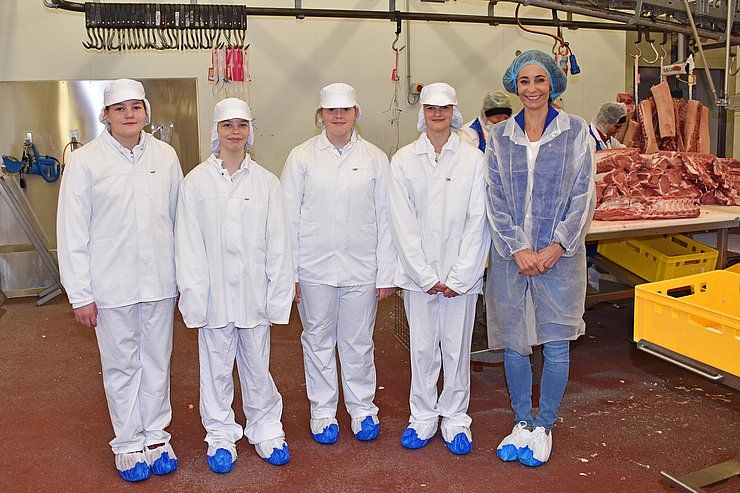 Gruppenfoto in Fleischerei